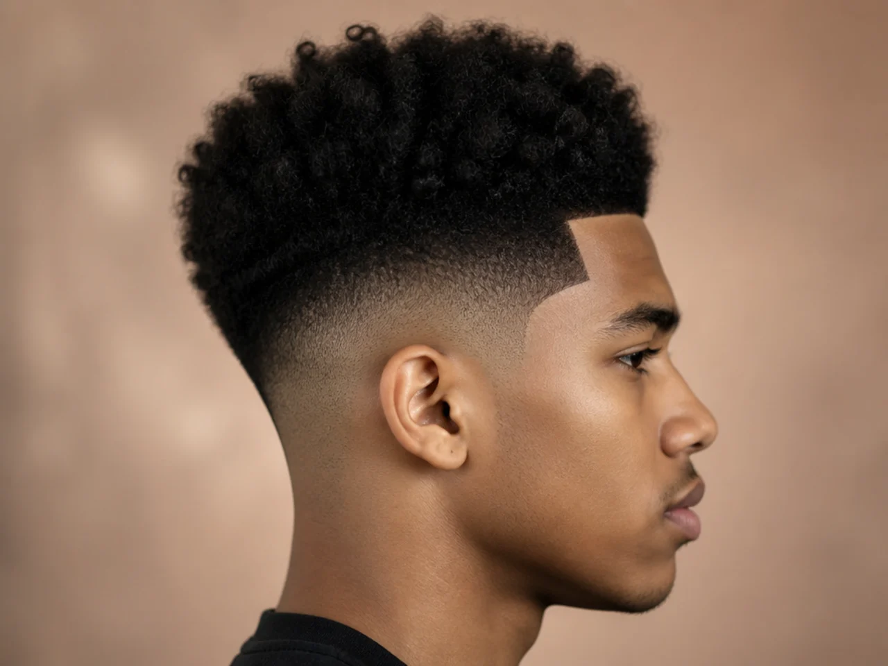An afro high fade with a line-up
