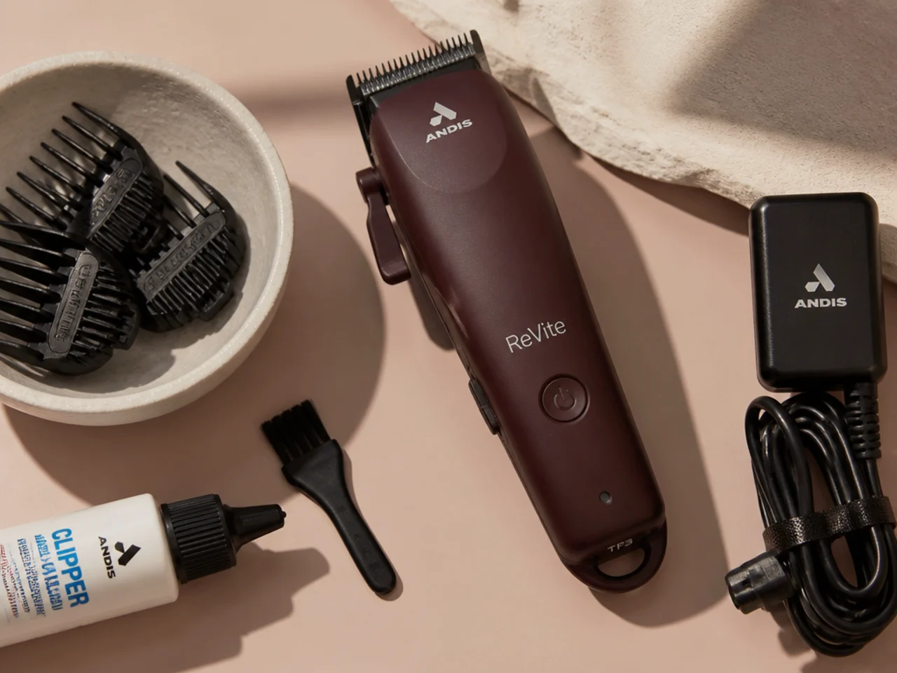 What are key features of Andis ReVite Clipper?