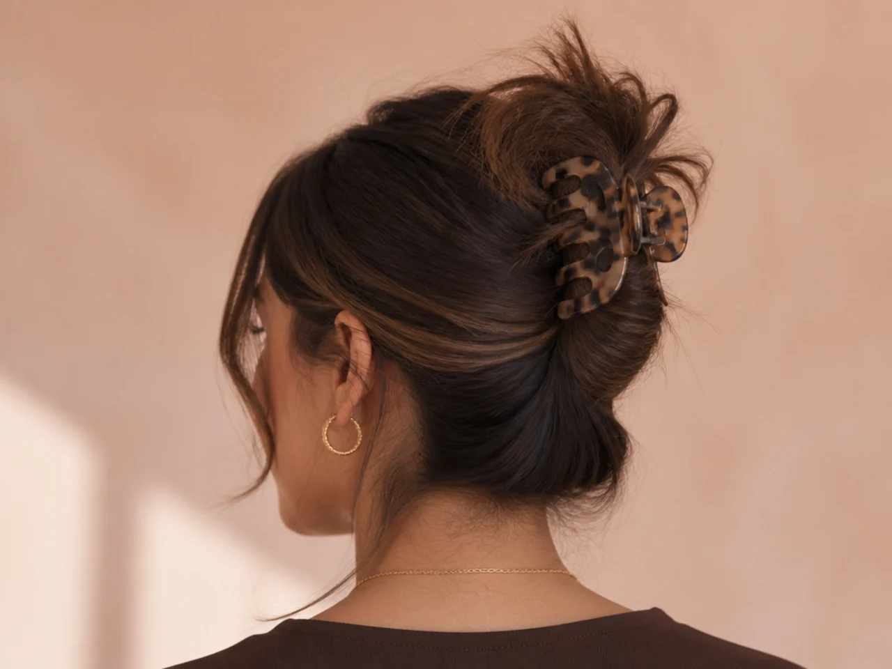 Deliberately messy claw clip bun