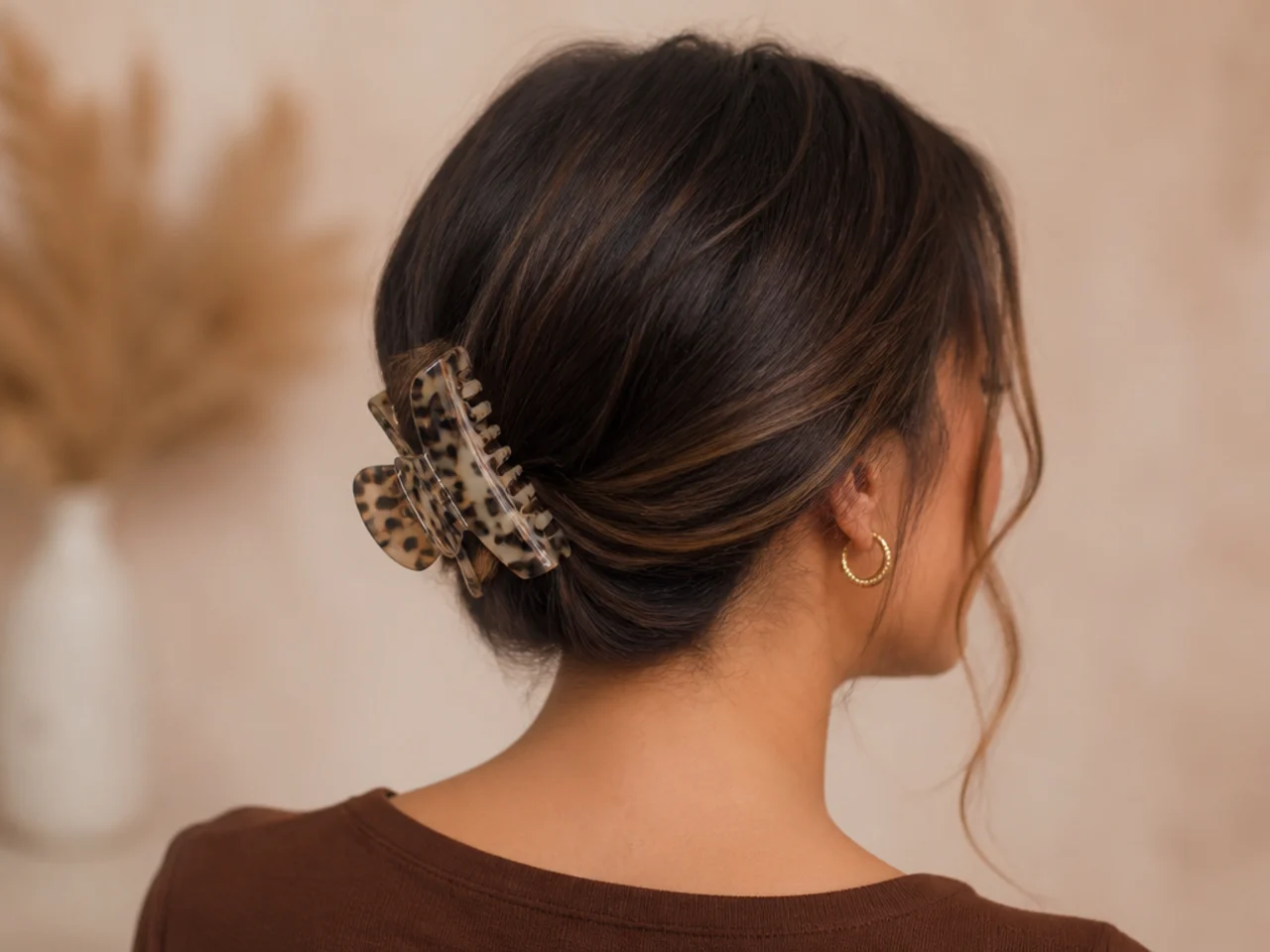 A low nape section gathered with a clip