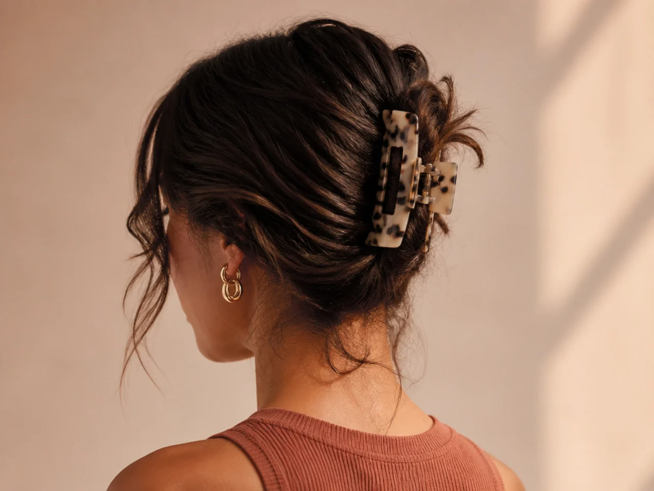 Short hair swept to one side and clipped