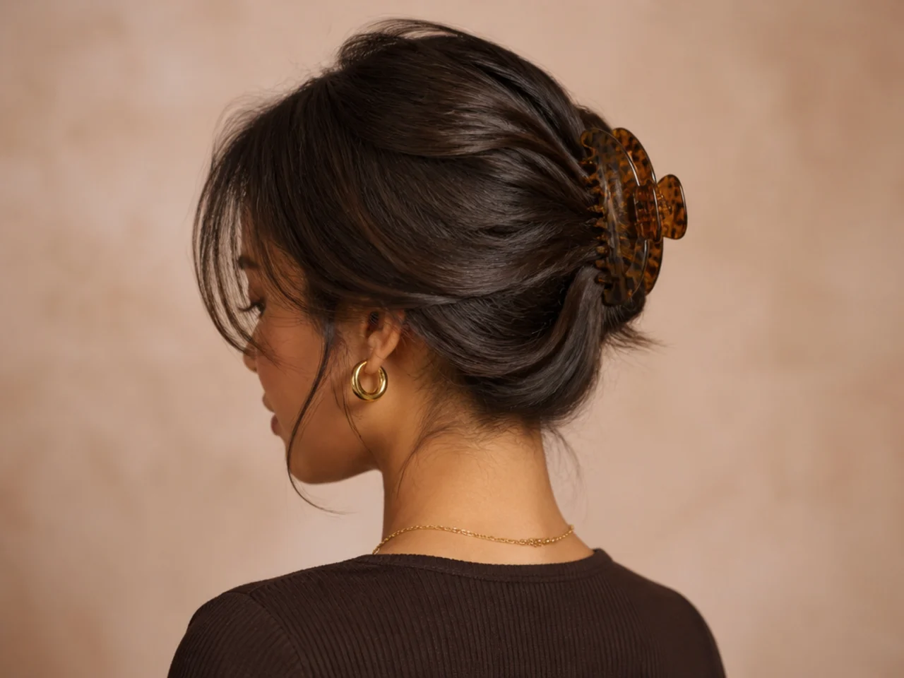 Three-quarter view of a finished short-hair clip style