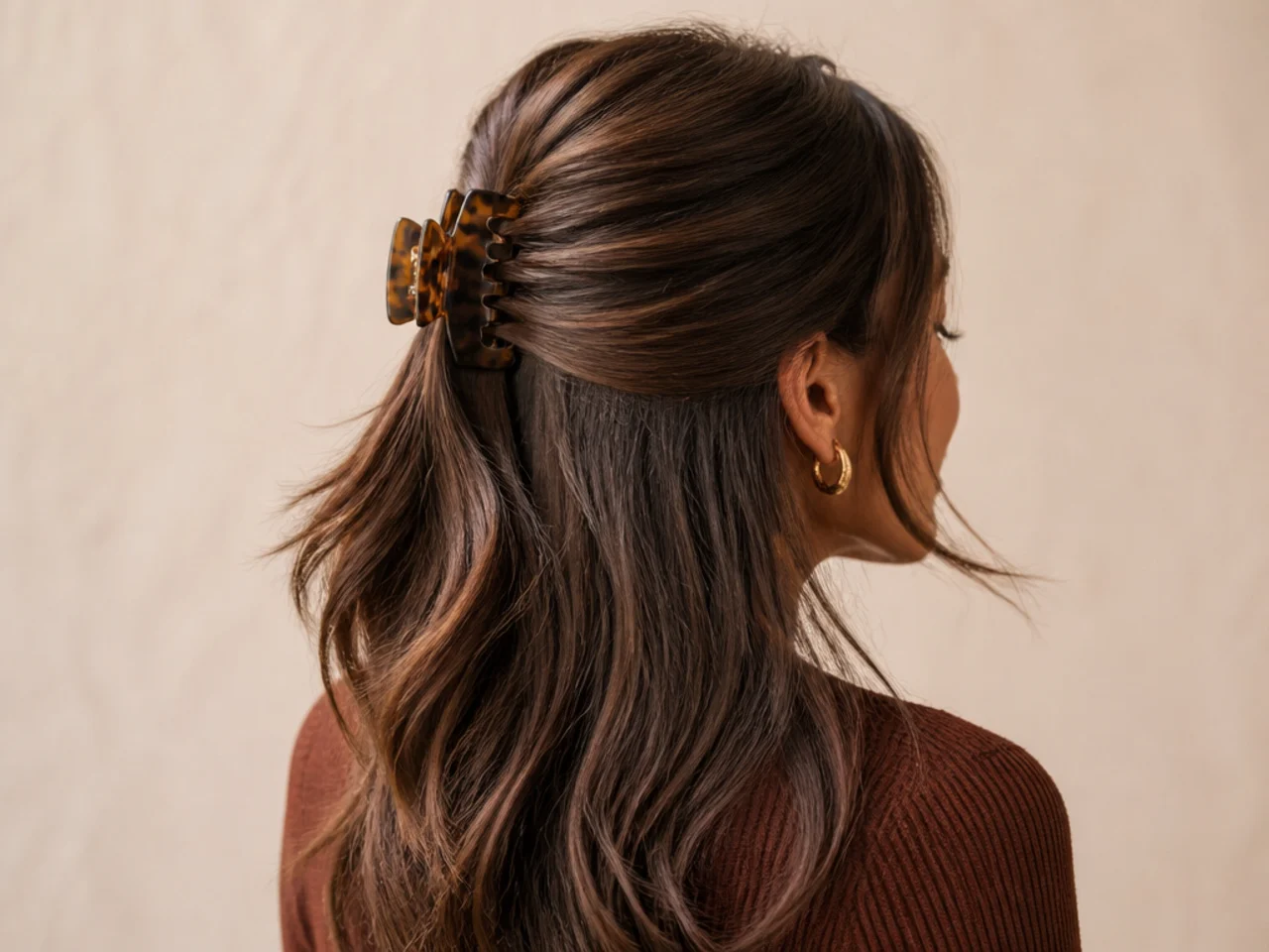 A clipped half-up on day-two hair