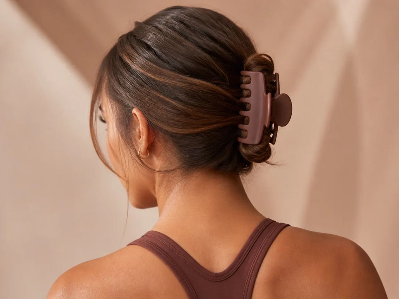 Tight low claw clip style for exercise
