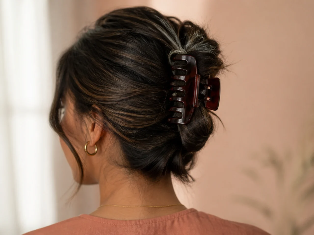 Thick hair held in a large deep-jawed claw clip