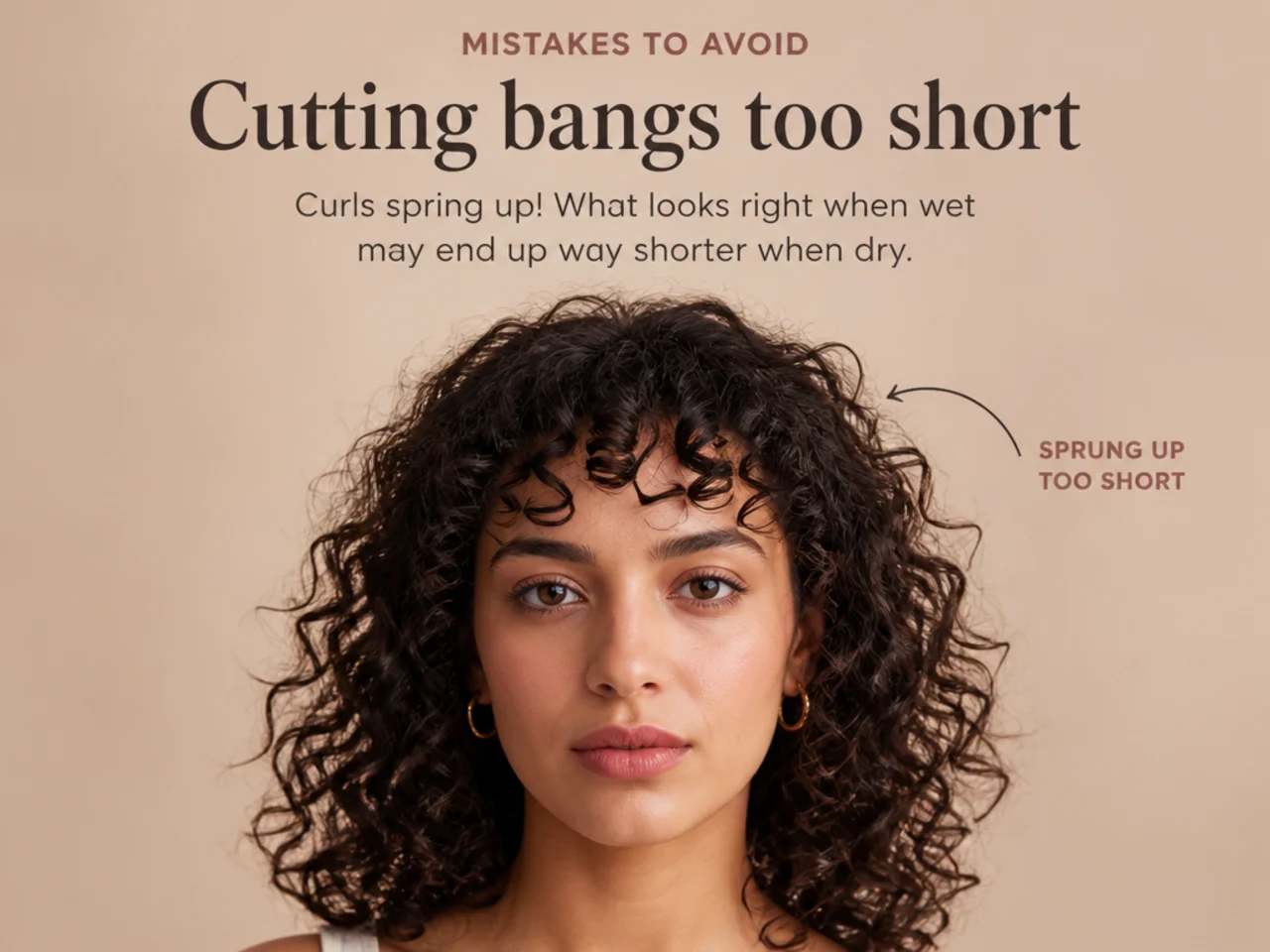 A curly fringe cut stretched that has sprung up too short