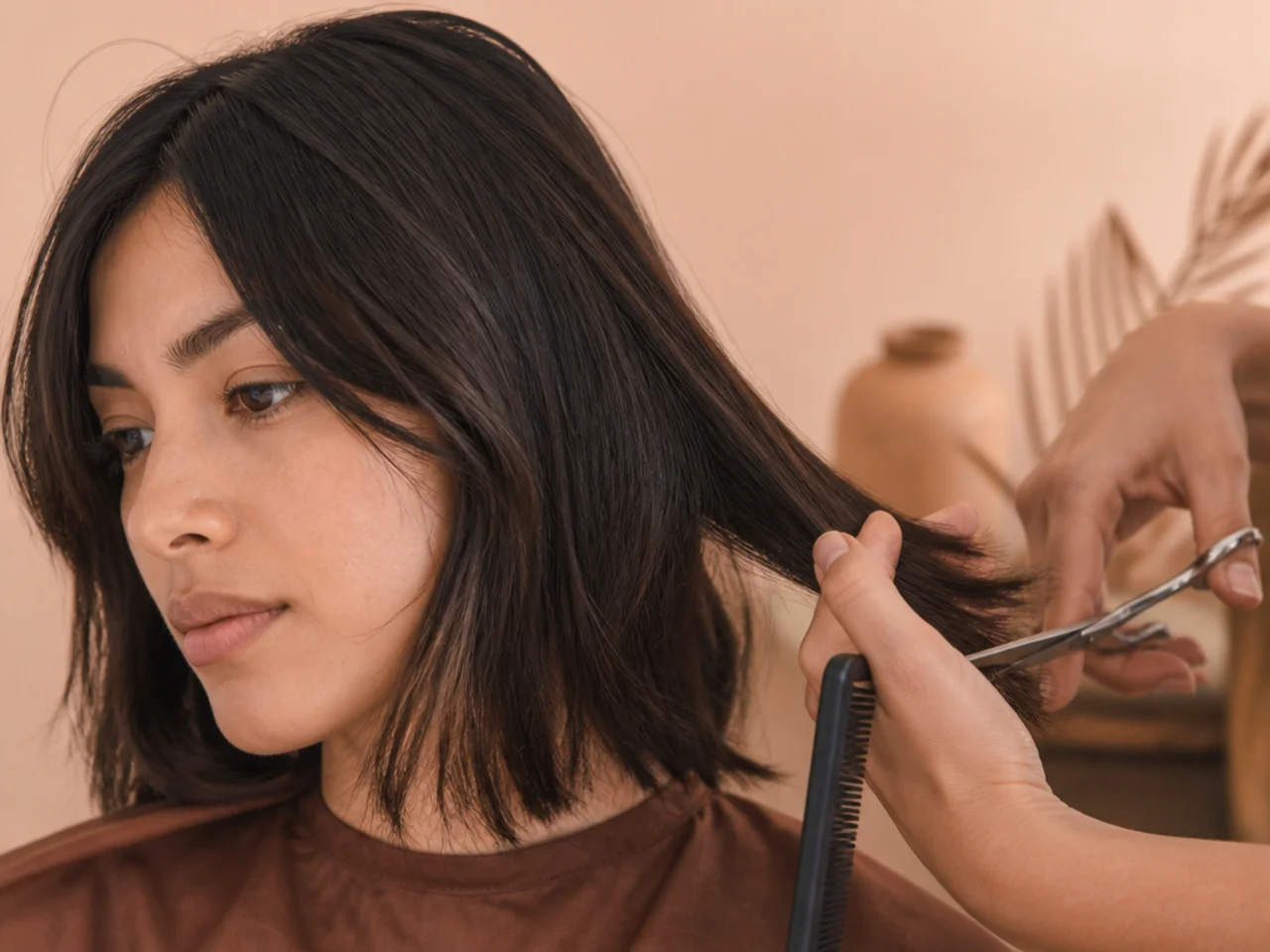 Dry hair being sectioned and cut without being dampened first