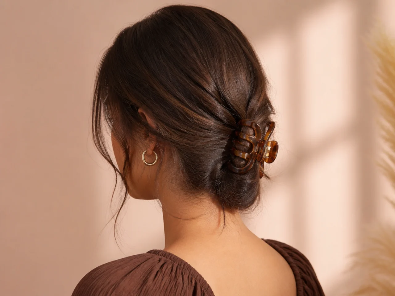 A low bun held with a claw clip
