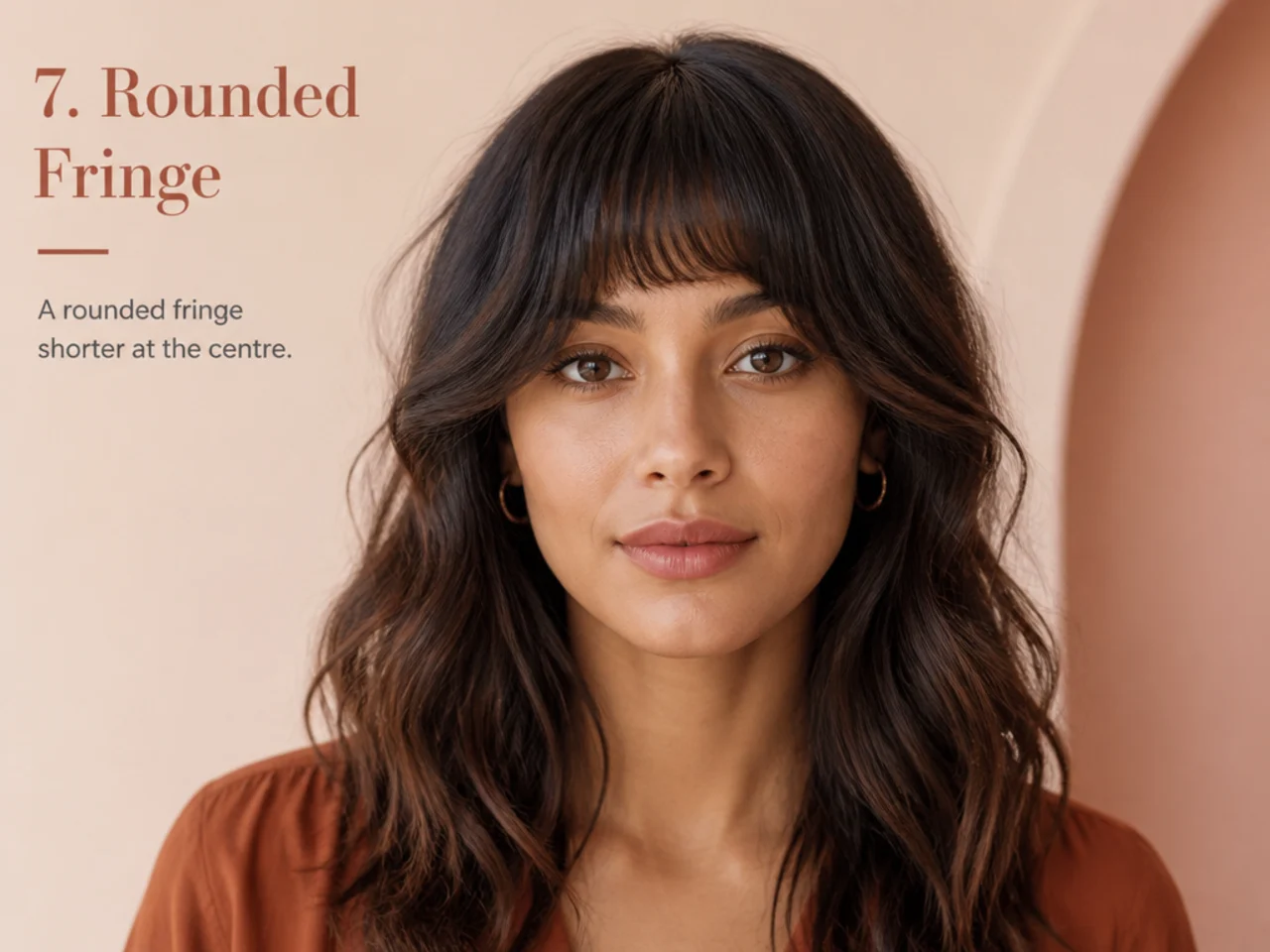 A rounded fringe shorter at the centre