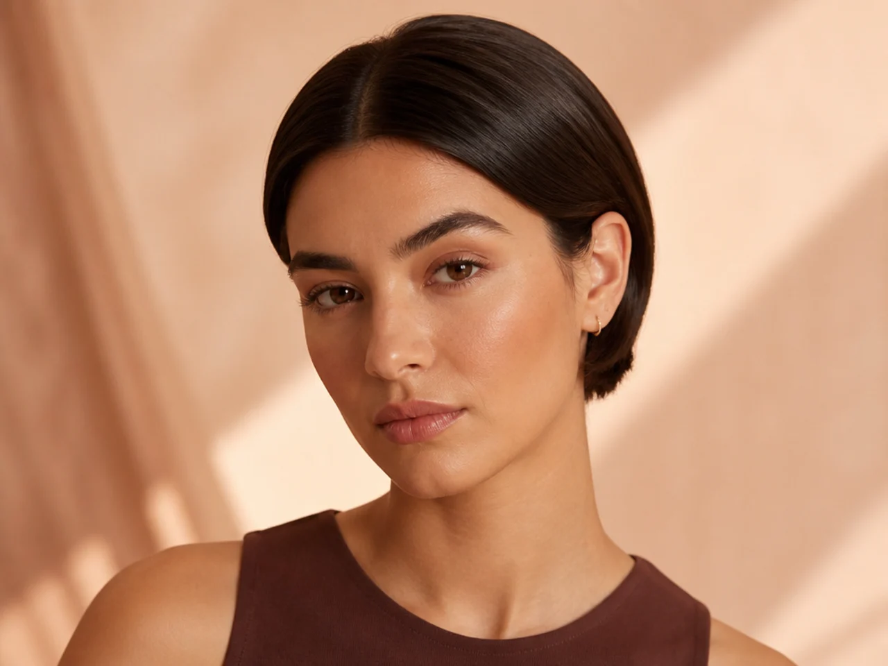 An ear-length cut tucked behind both ears