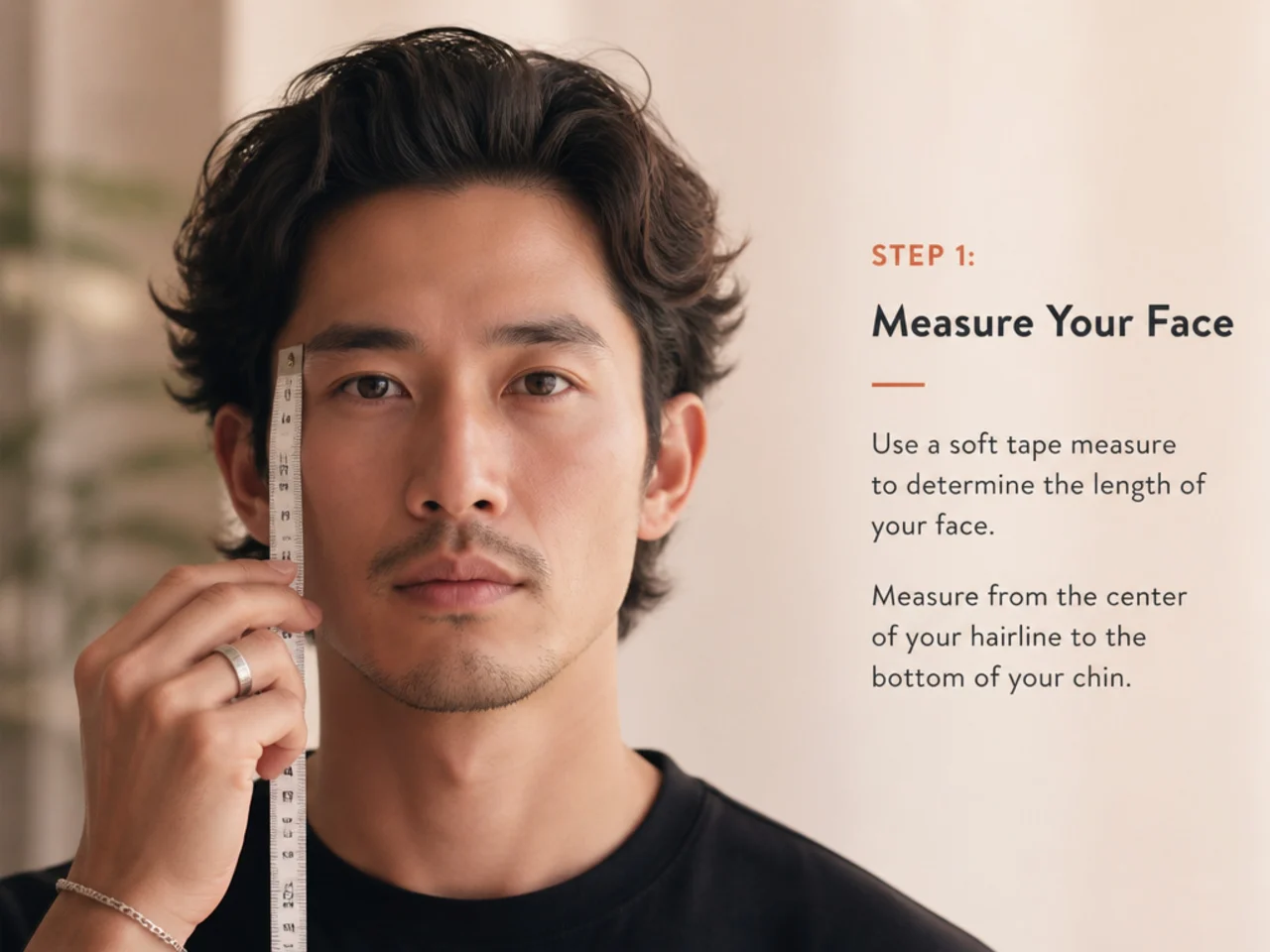Man measuring his forehead width in a mirror with a soft tape measure