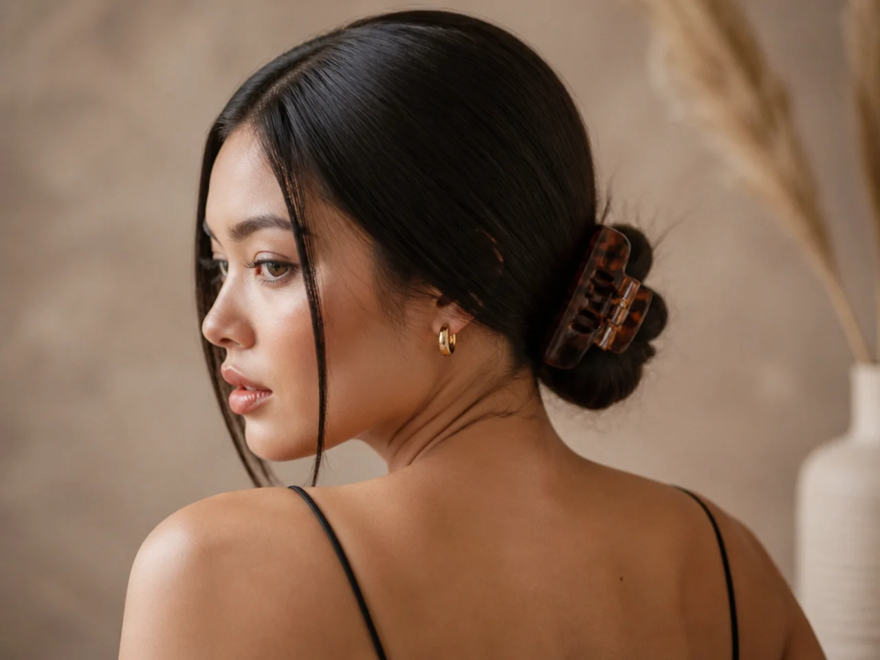 A low bun held with a jaw clip