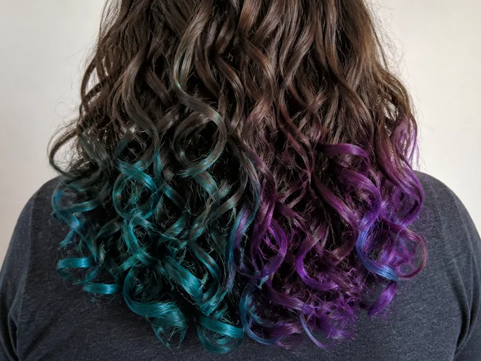 Mermaid curls Halloween hairstyle with teal and purple temporary color
