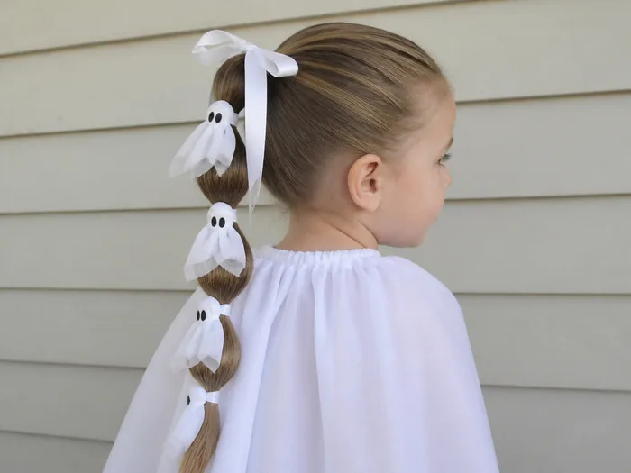 Bubble braid ghost Halloween hairstyle for kids with white ribbon