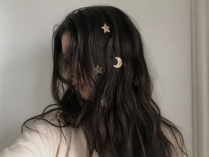 Whimsigoth undone waves Halloween hairstyle with gold star and moon hair pins