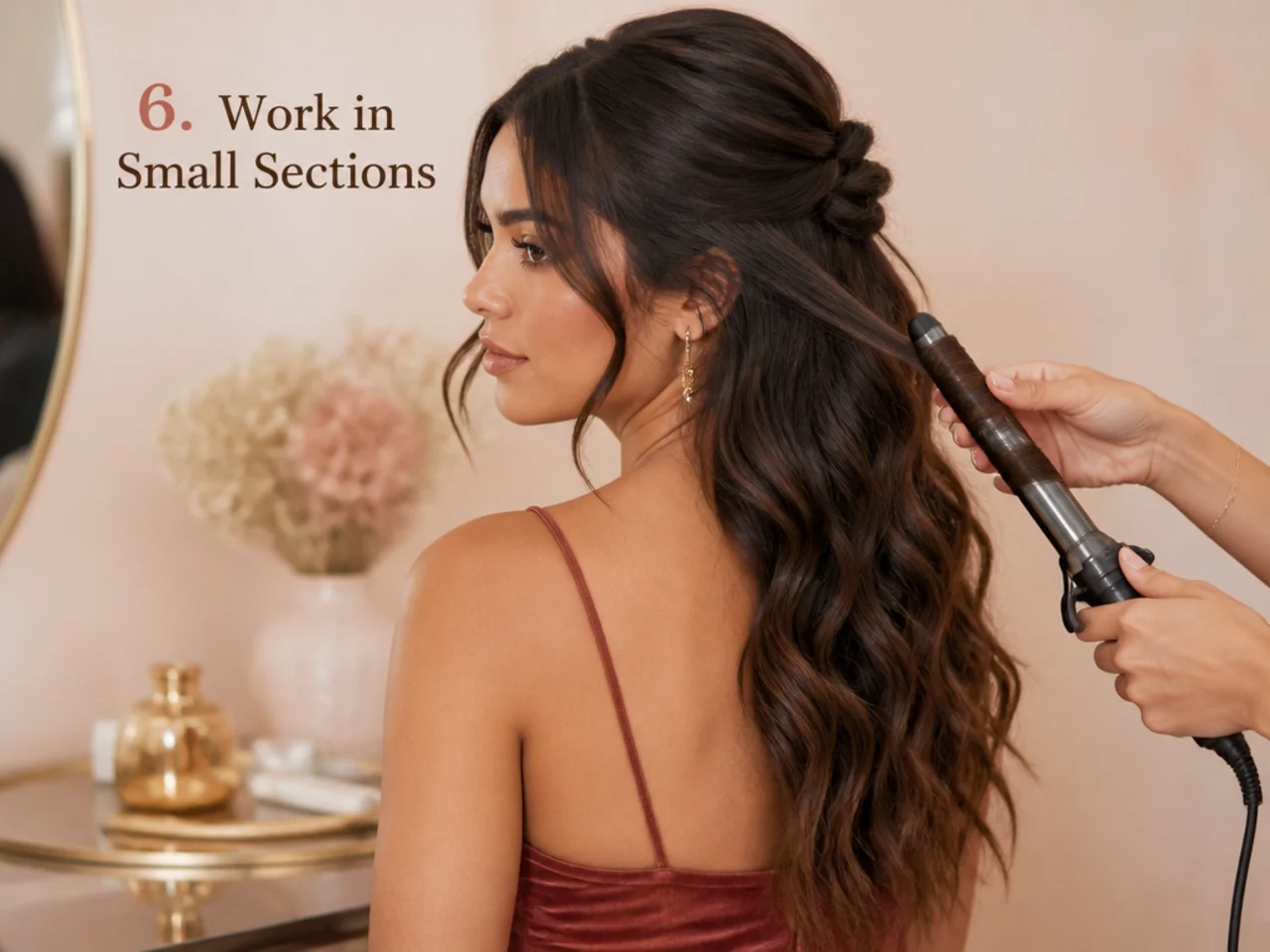 A small section being wound onto a curling iron