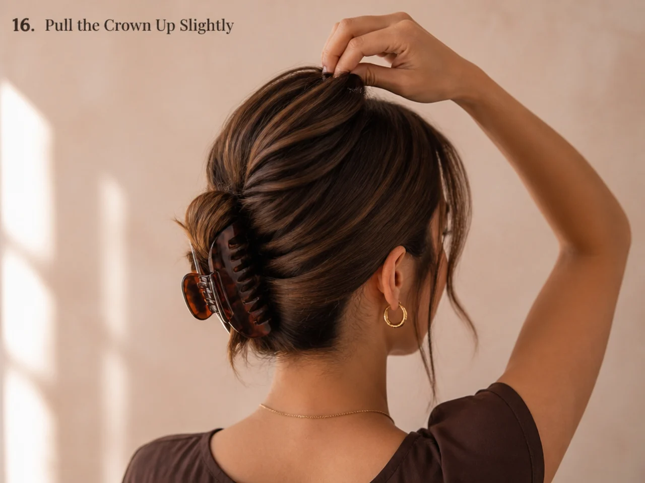 Crown pieces being gently pulled up for volume