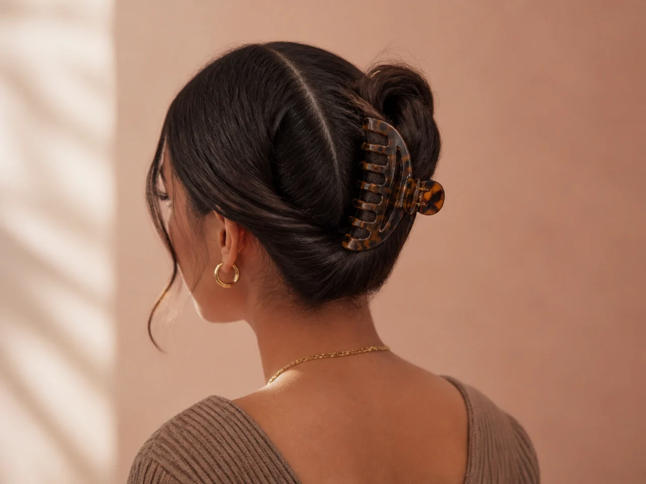 A centre parting combed cleanly