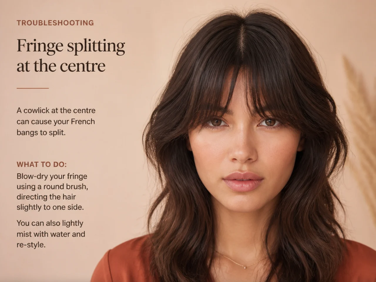 A fringe splitting at the centre from a cowlick