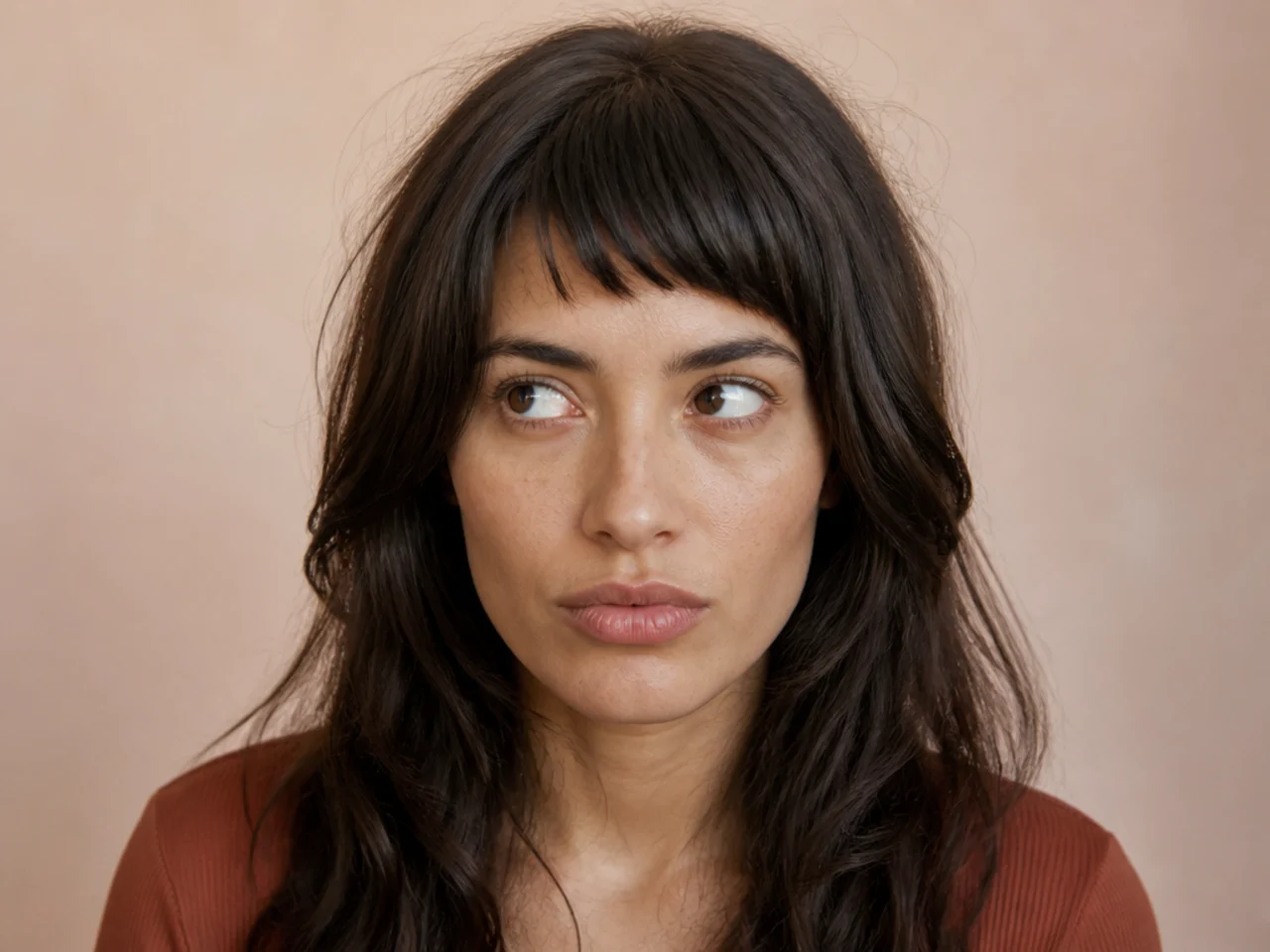 A fringe cut too short from being held under tension