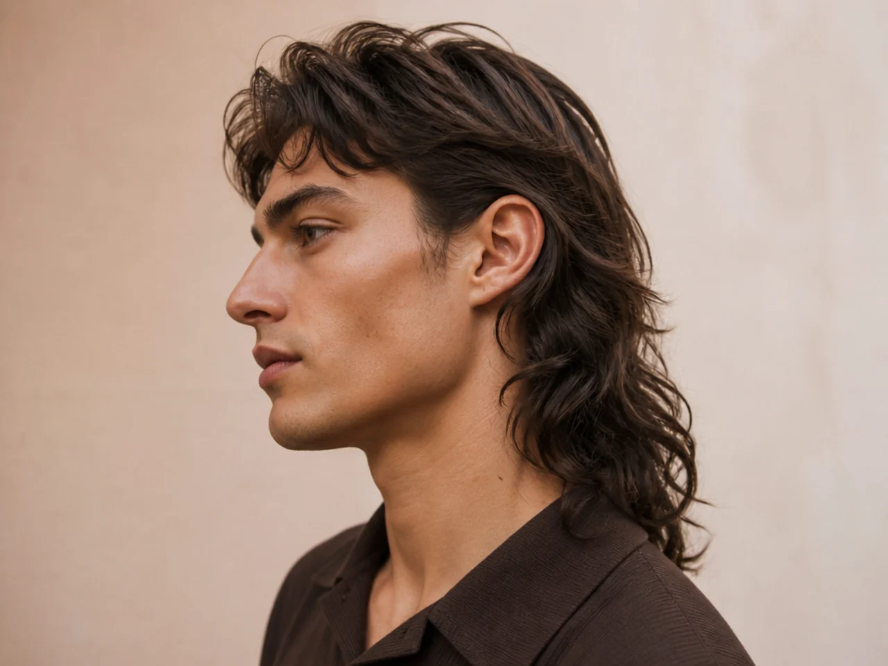 A mullet with the sides tucked behind the ear