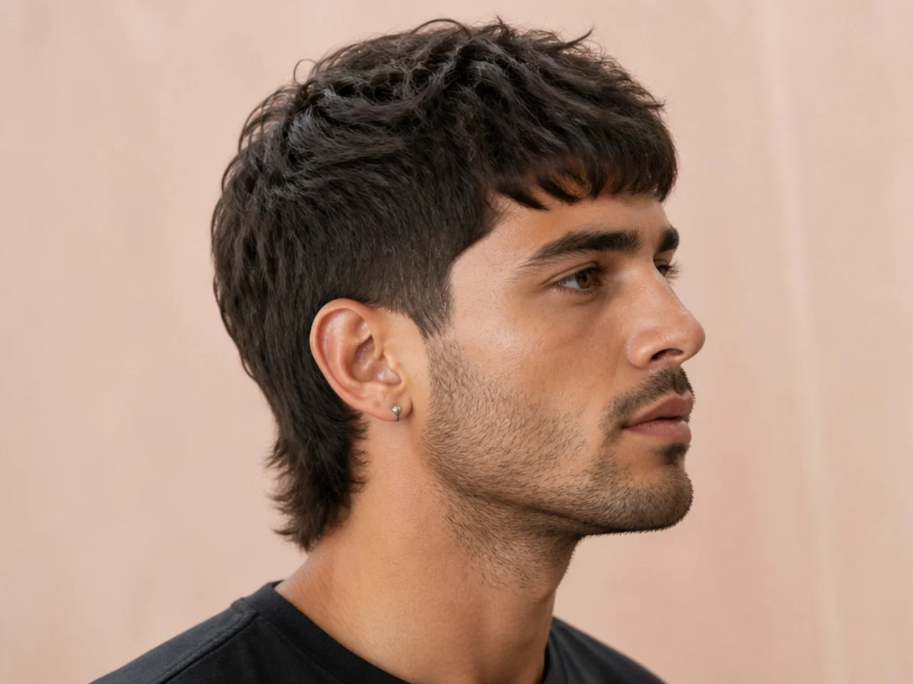 Tapered short mullet with scissor-graded sides and textured top, no visible fade line