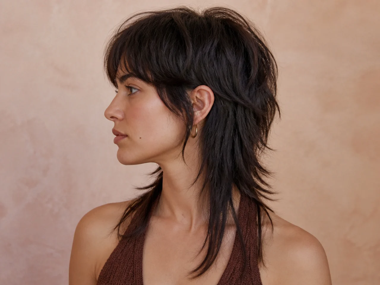 A mullet with over thinned ends and a hard step