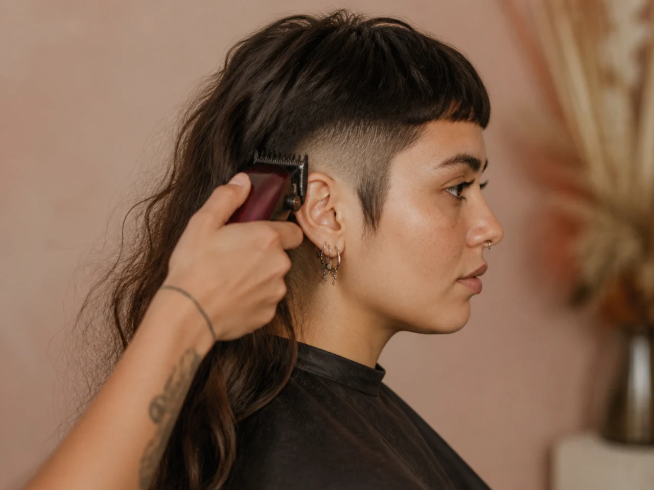 Clippers running up the side of the head while the back is left long