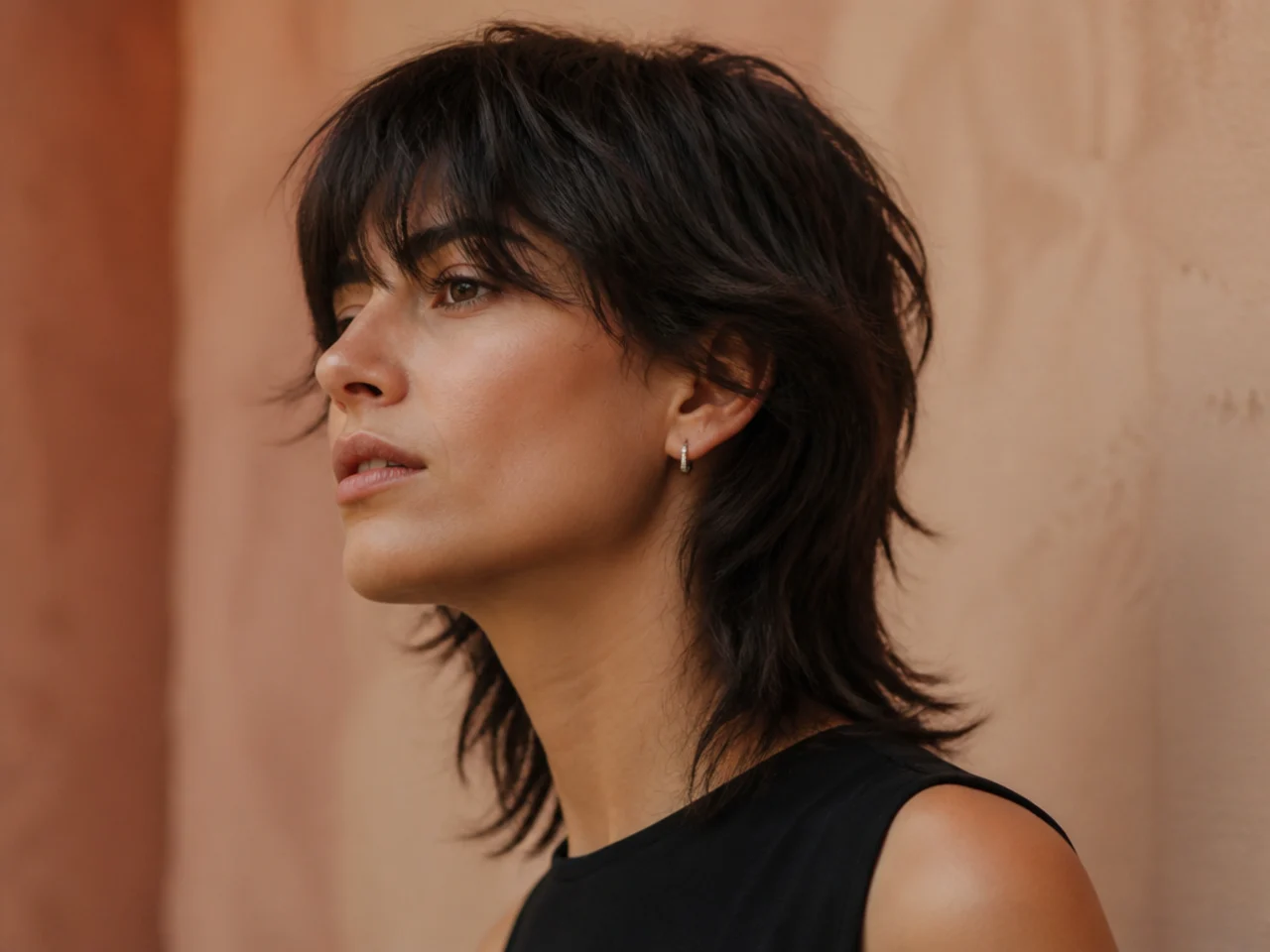 A mullet cut with point cut textured ends