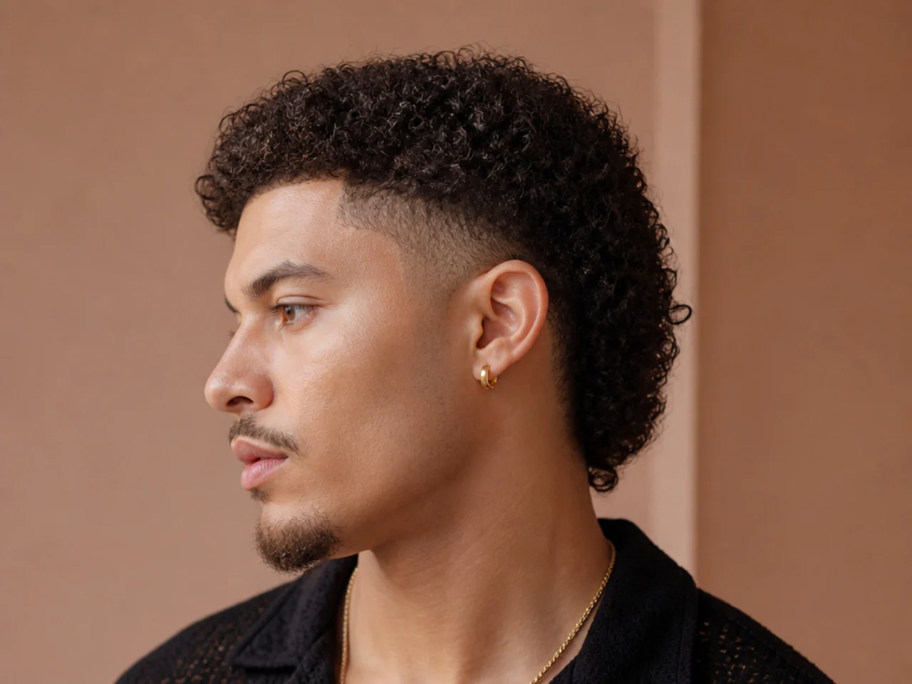 A coily mullet with a faded side