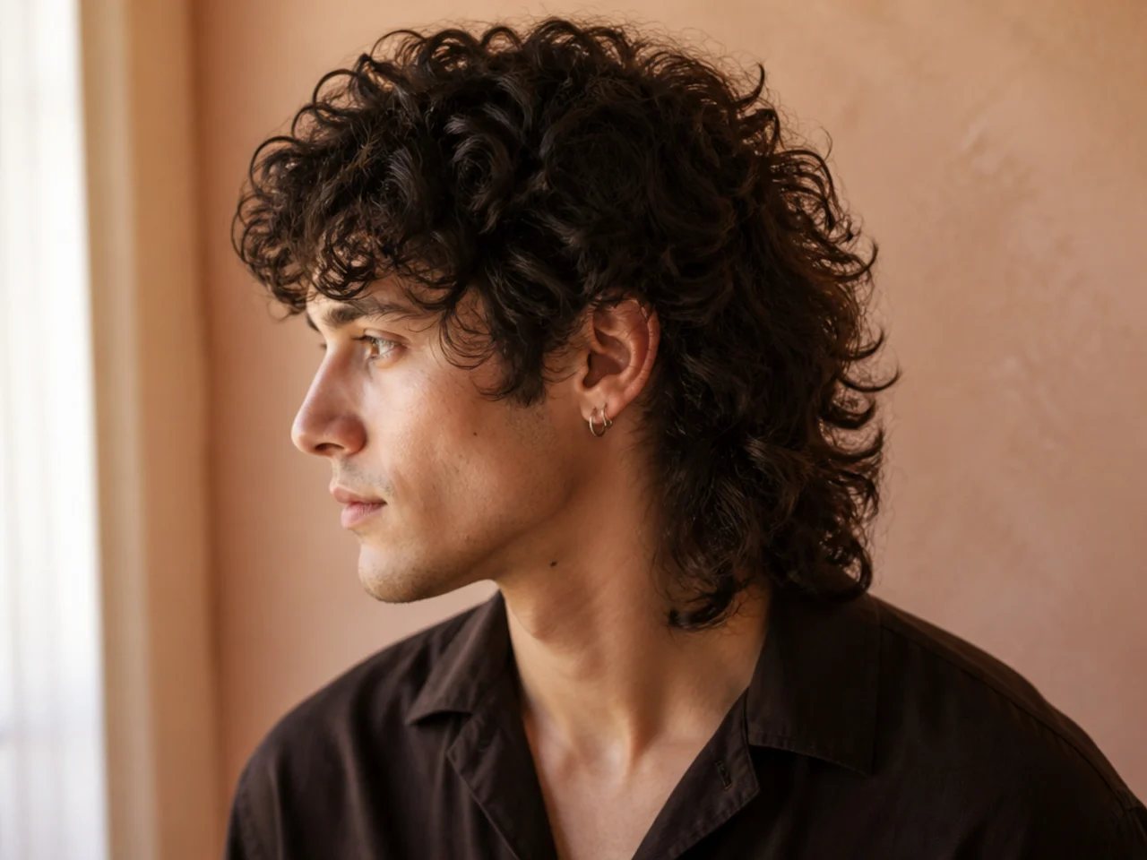 A curly mullet with a longer crown