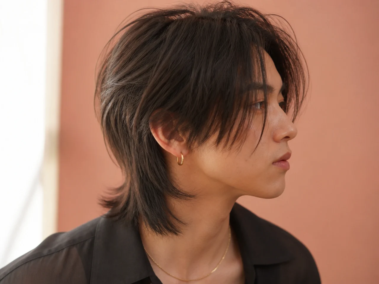 A mullet hidden under longer side hair