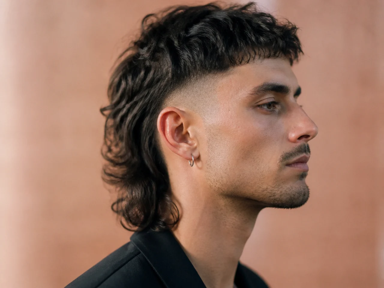 A mens mullet with the sides taken to bare skin
