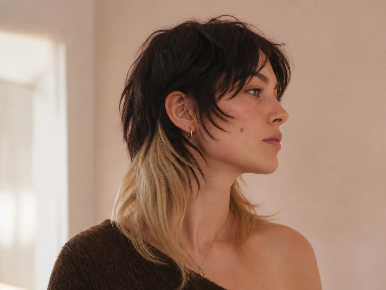 A womens mullet with a bleached tail and darker front