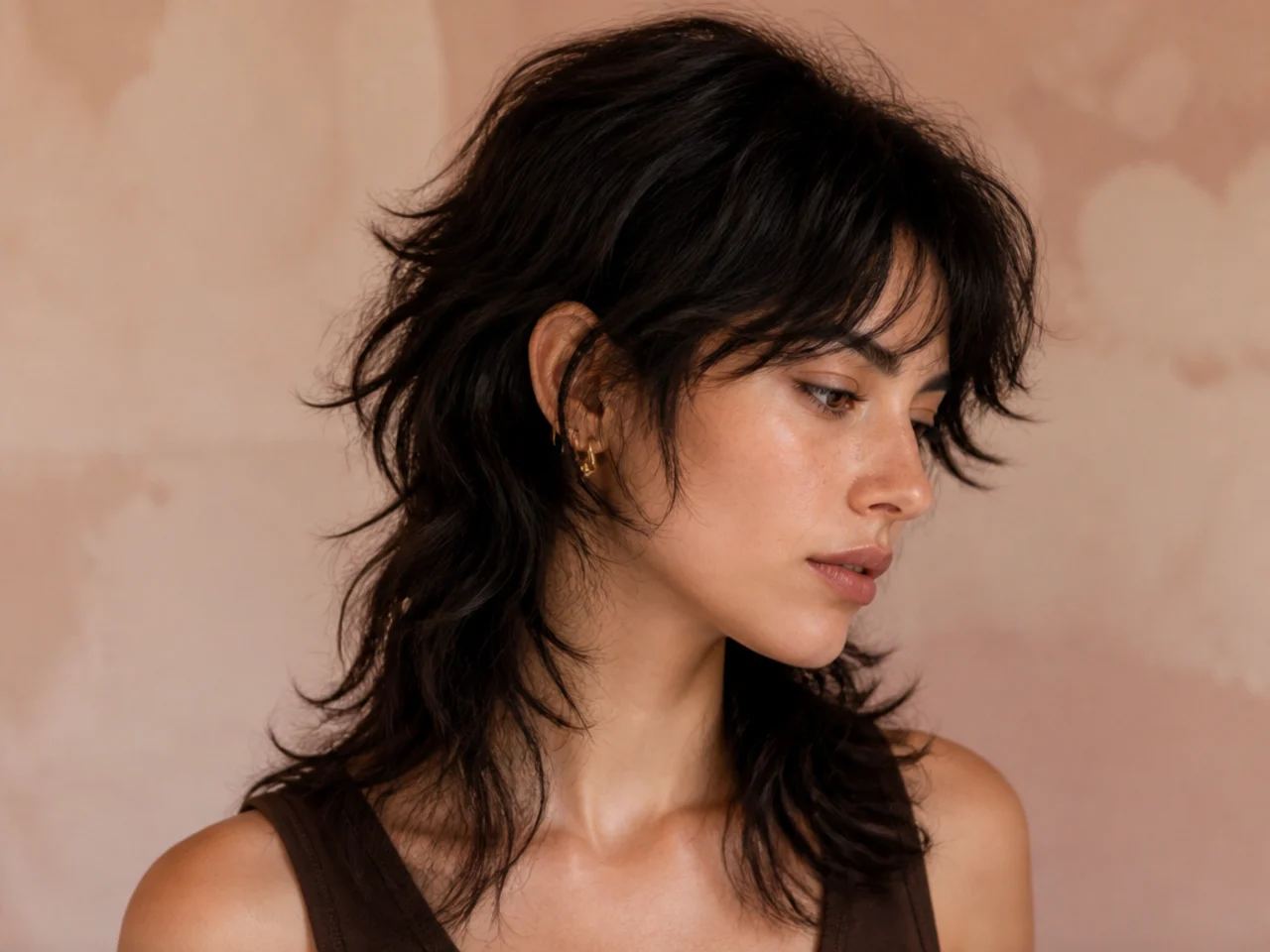 A shaggy womens mullet with layers through the crown