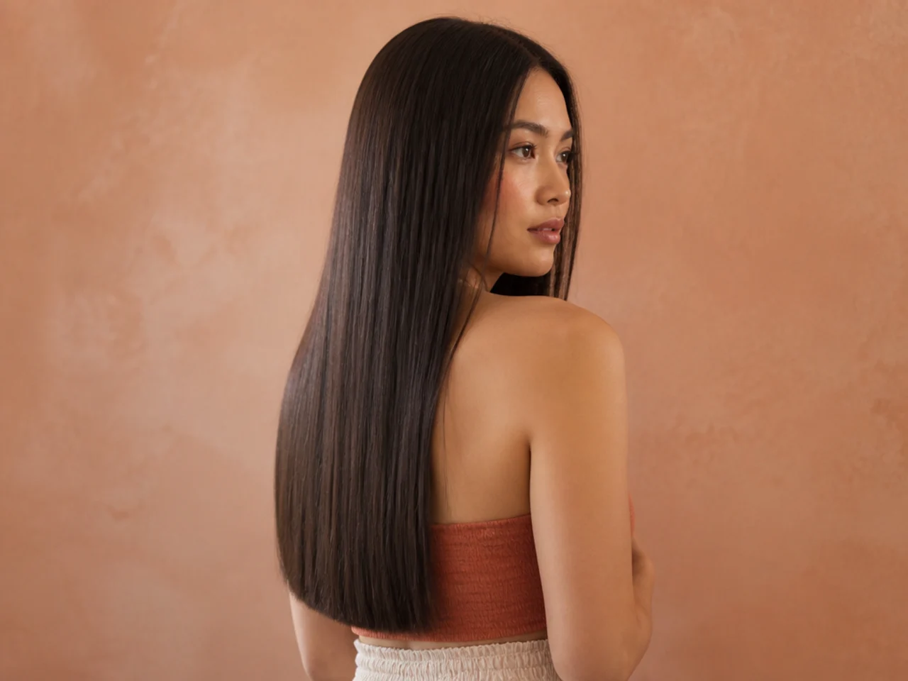 Long hair hanging in one solid flat sheet with a hard blunt hem