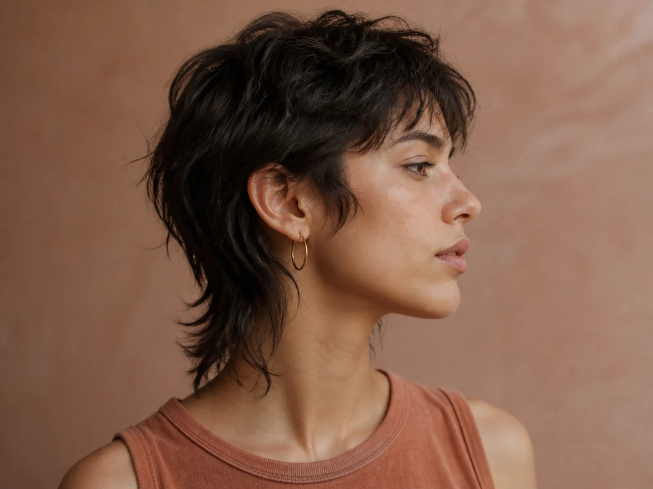 A pixie growing out into a short mullet shape