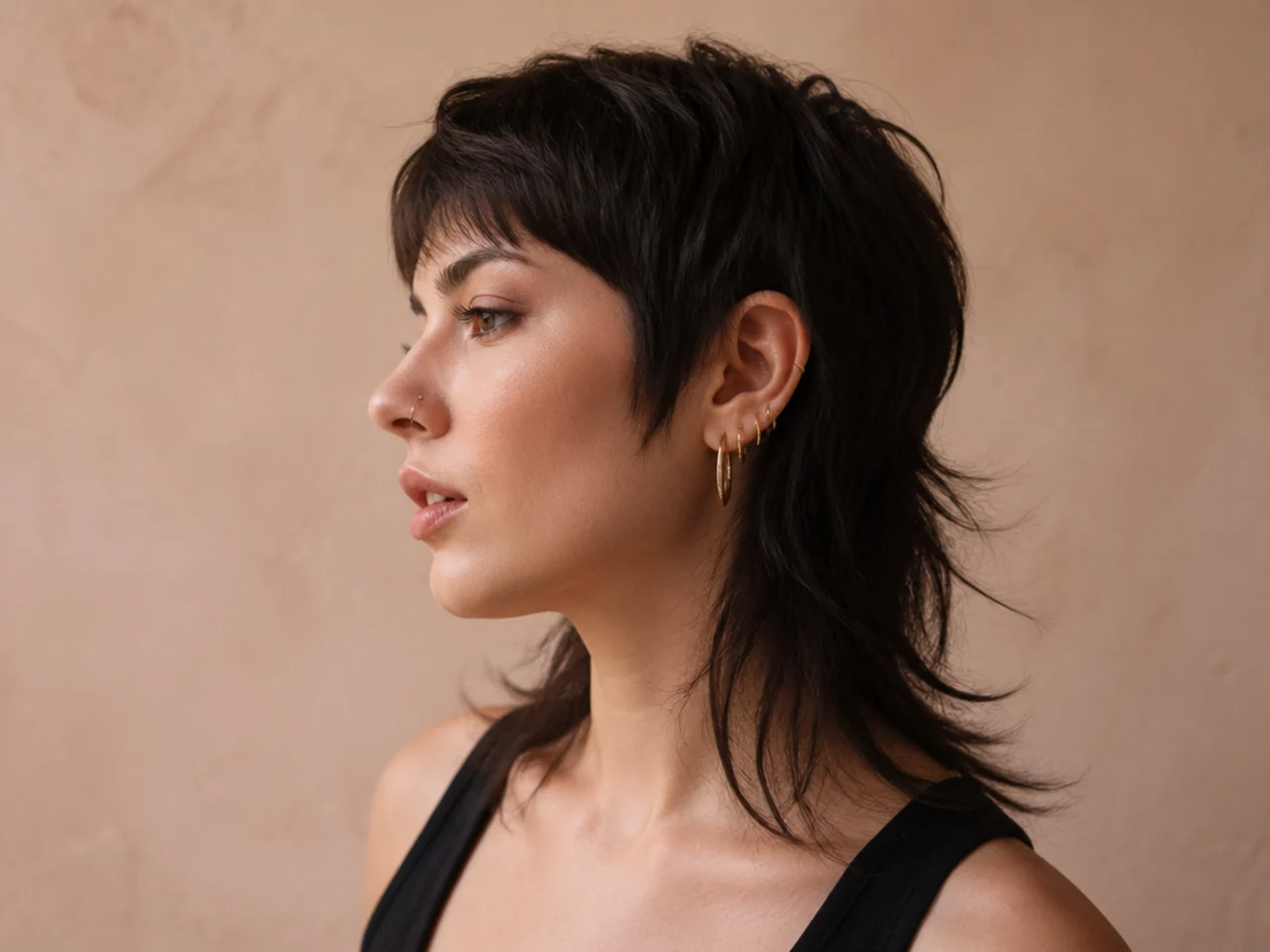 A mullet with short sides narrowing the width at the cheeks