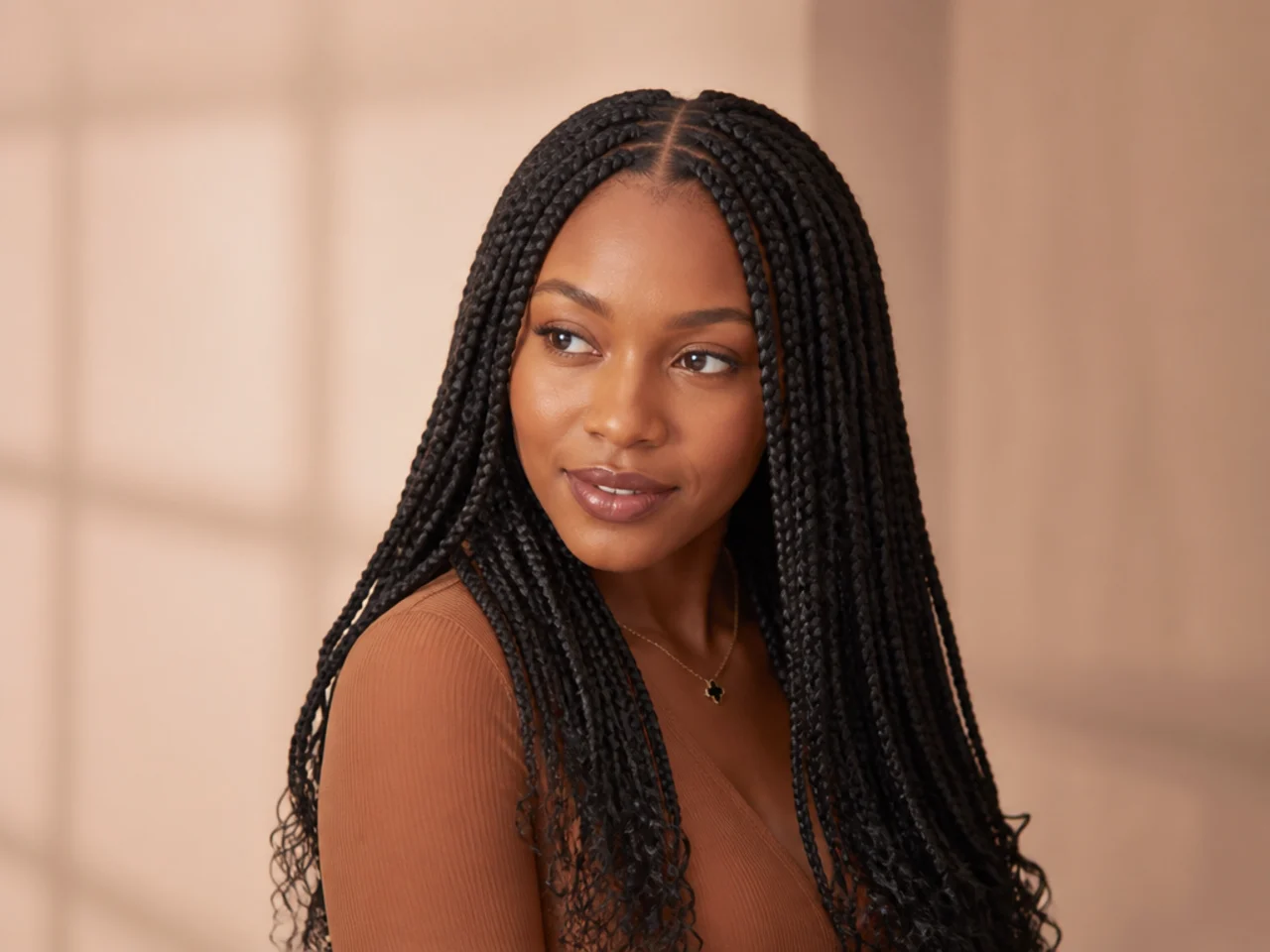 Medium braids with a clean centre part