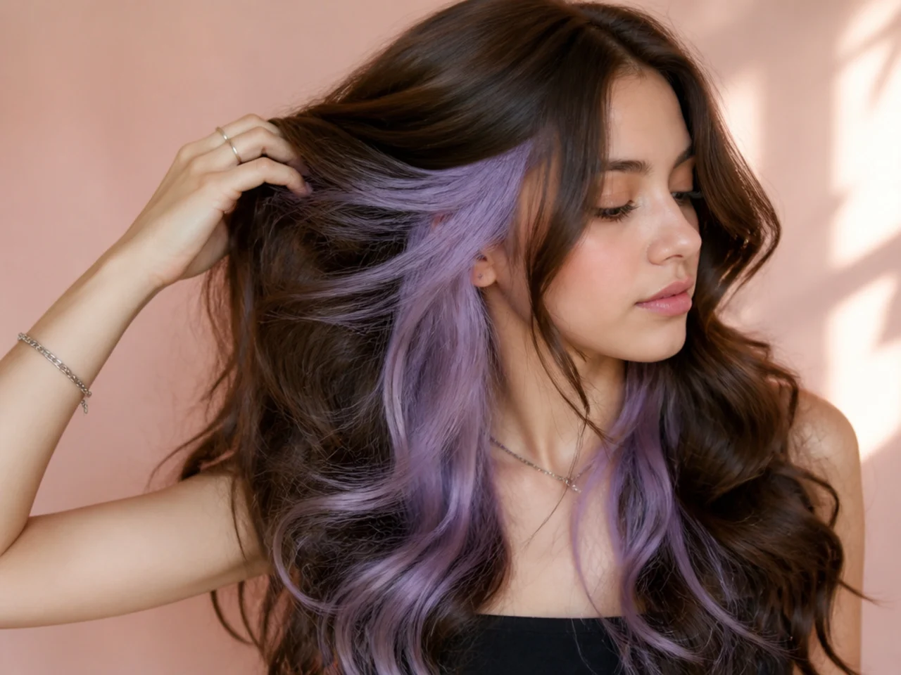 Brown hair lifted to show pale lavender panels underneath