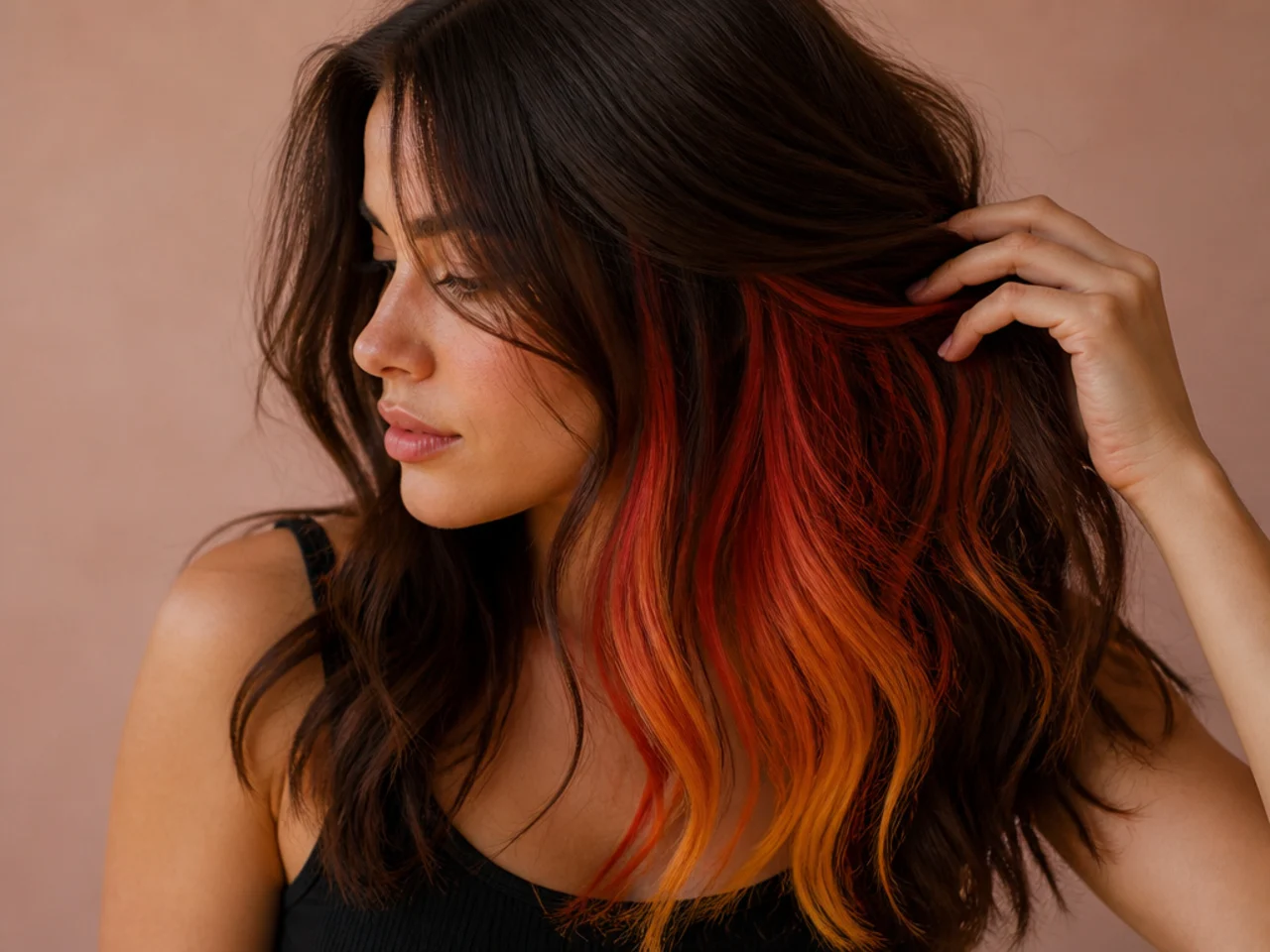 Brown hair with a hidden panel graduating from red through orange to gold
