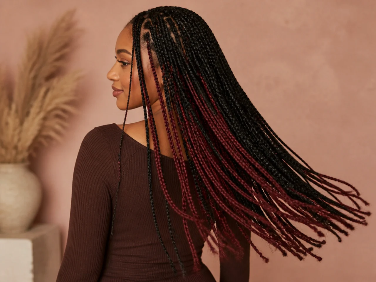 Coloured extension hair added into selected braids