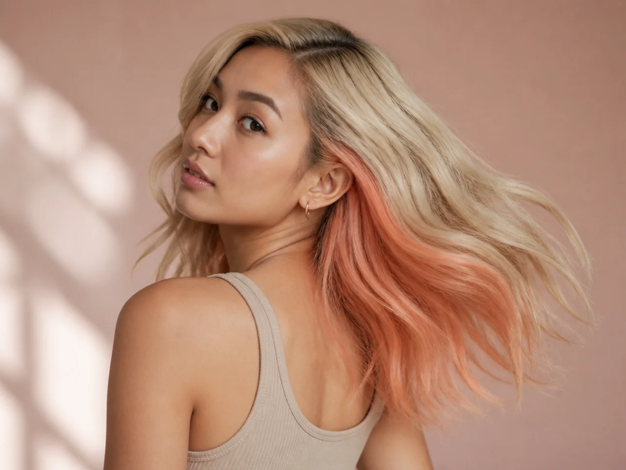 A peach panel on blonde hair