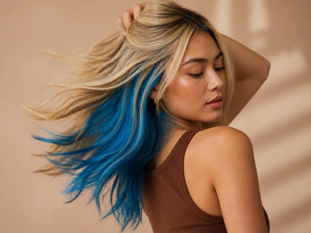 An electric blue panel on blonde hair
