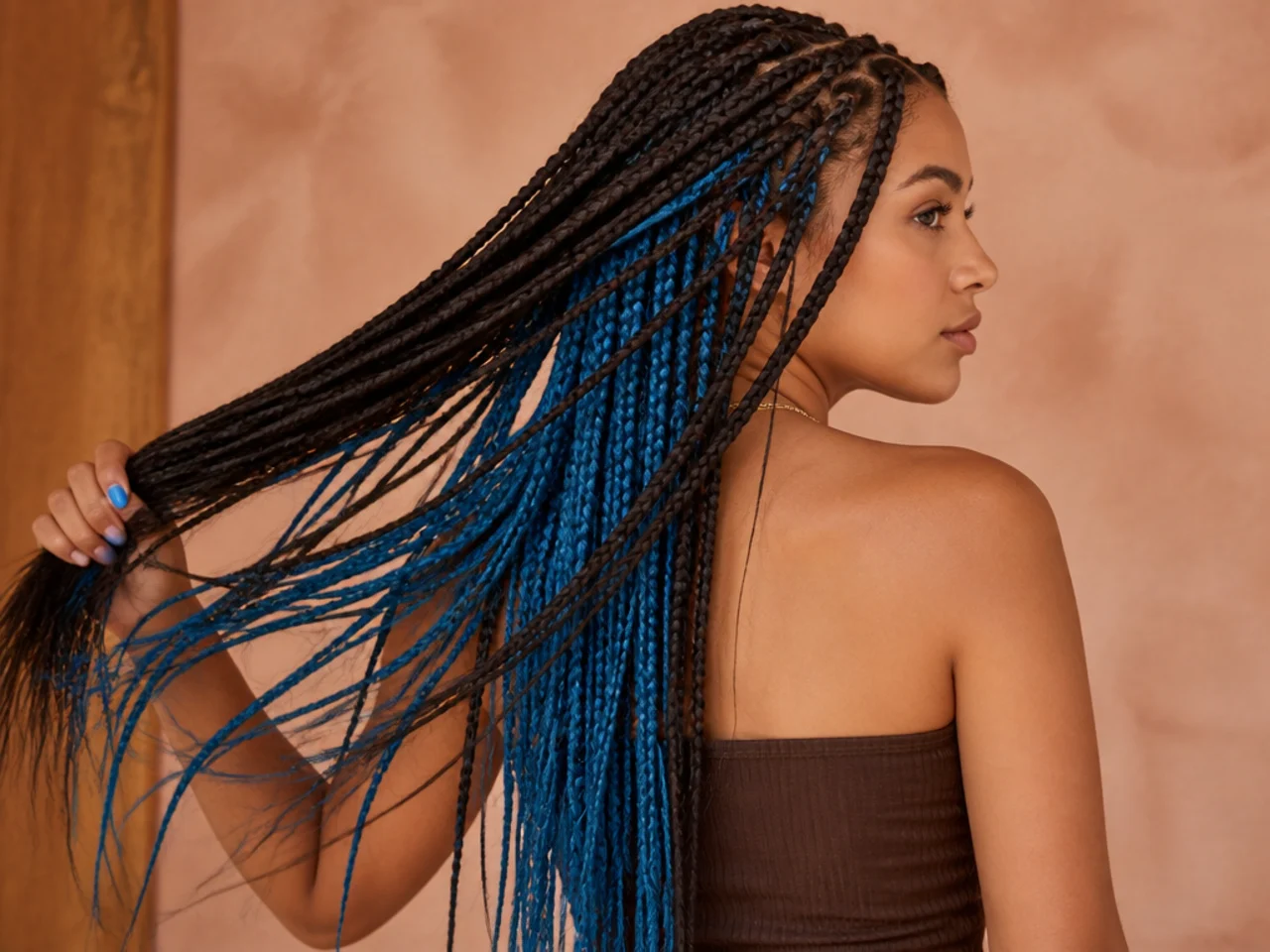 Blue extension hair added to braids