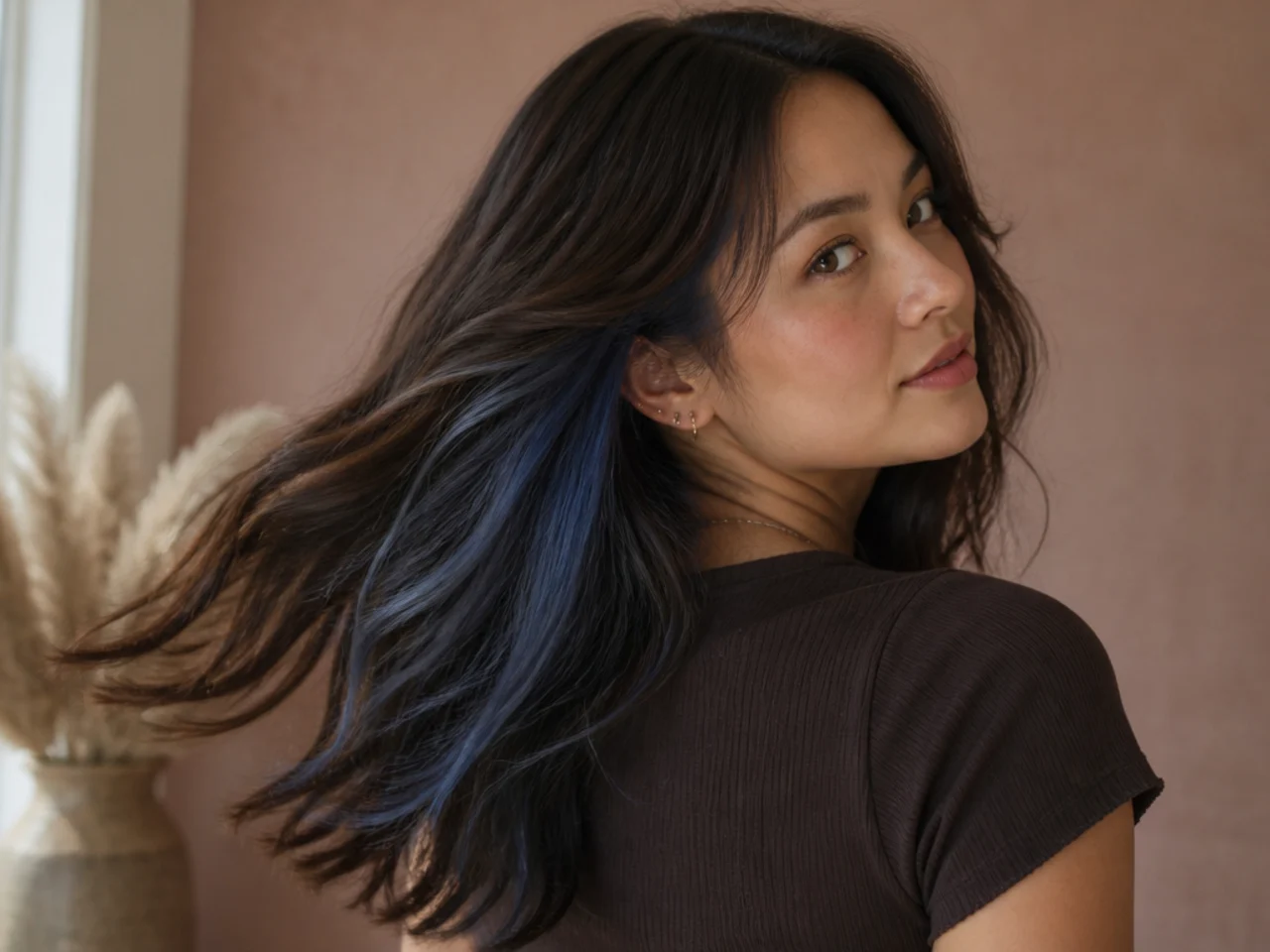 A steel blue panel under brunette hair