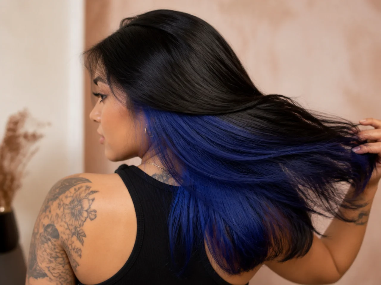 A cobalt panel under black hair