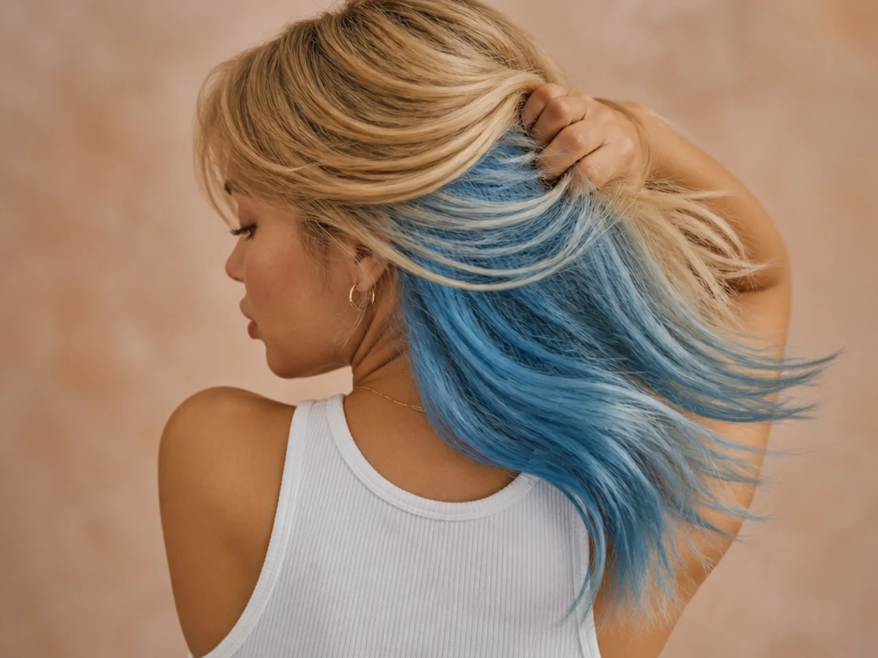 A sky blue panel under blonde hair