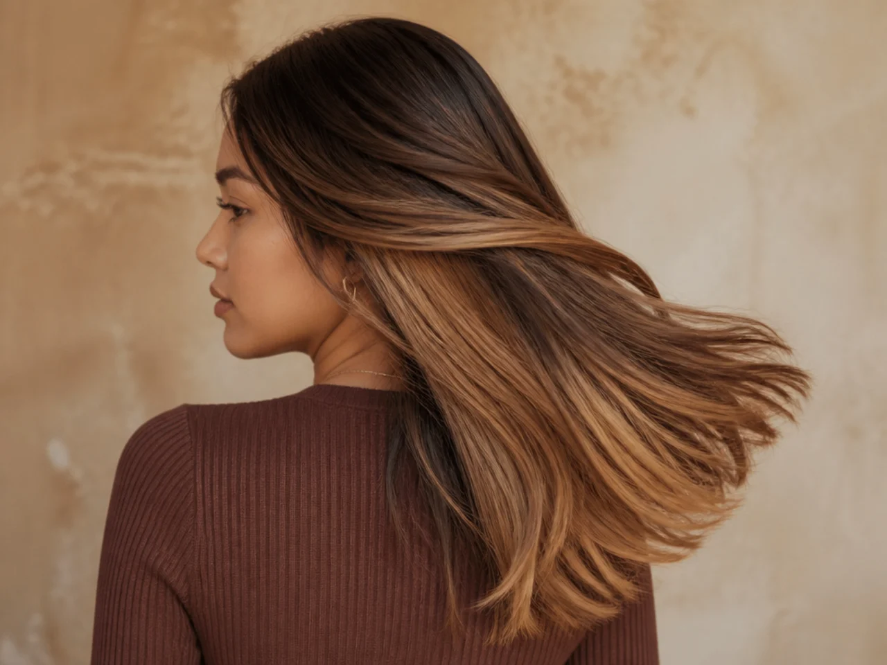 A toffee panel under dark blonde hair
