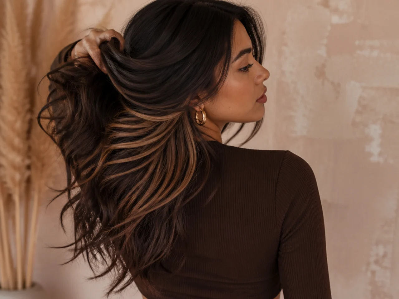 A caramel panel under dark brown hair